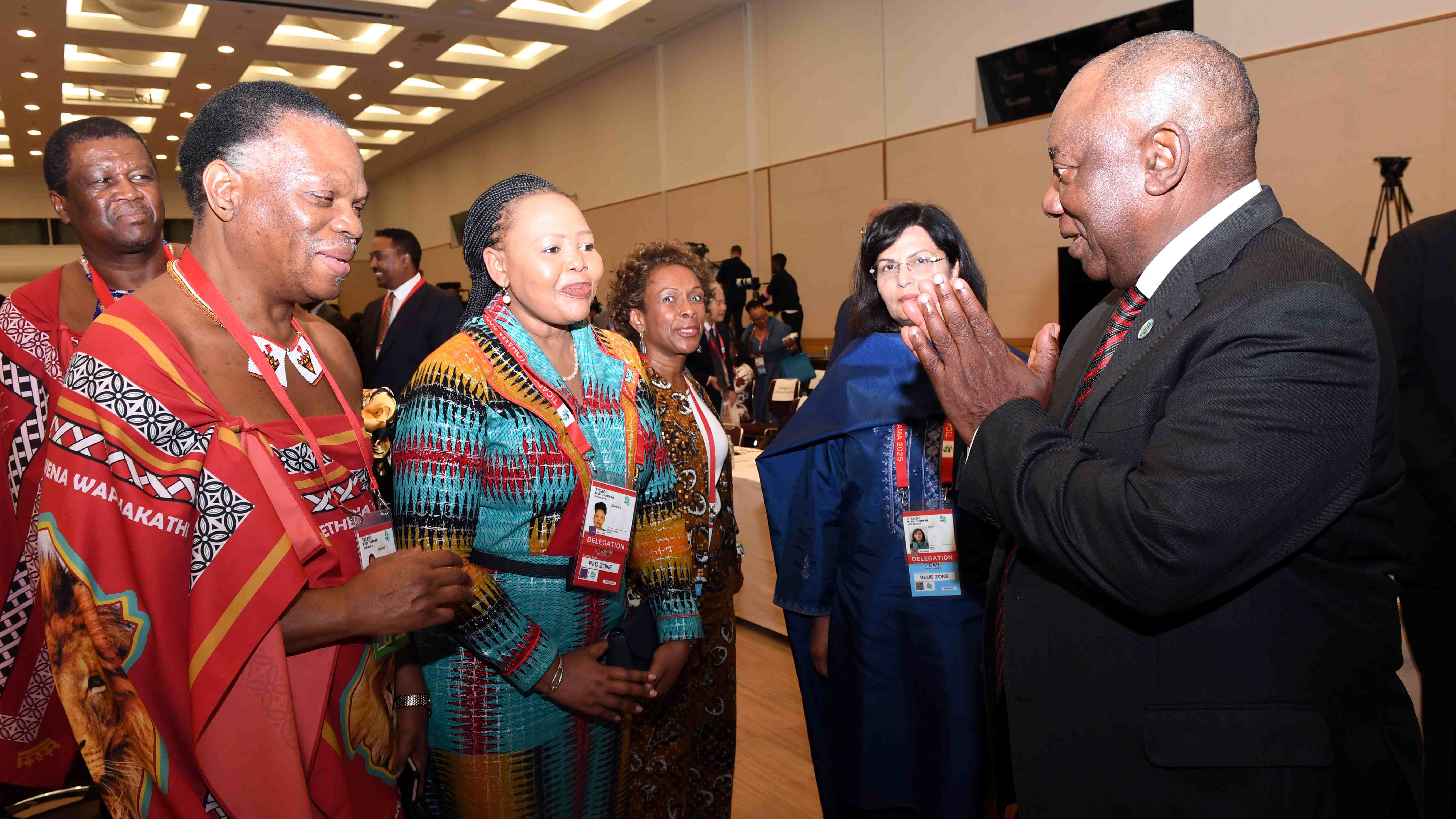 South Africa President Cyril Ramaphosa greeting Minister for Foreign Affairs and International Cooperation Pholile Shakantu and Minister for Natural Resources and Energy Prince Lonkhokhela. 